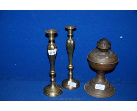 A pair of brass Candlesticks and an Oil Lamp Base.