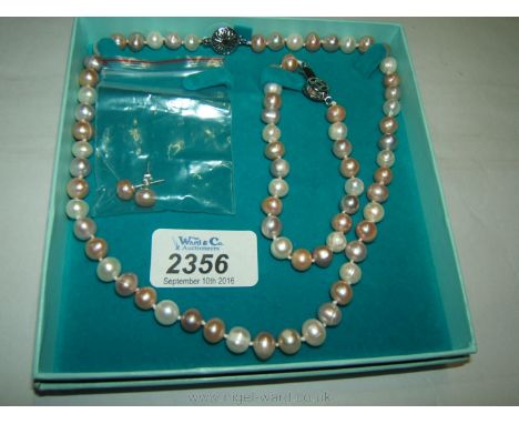 A Freshwater Pearl Necklace, Bracelet and Ear-rings, modern