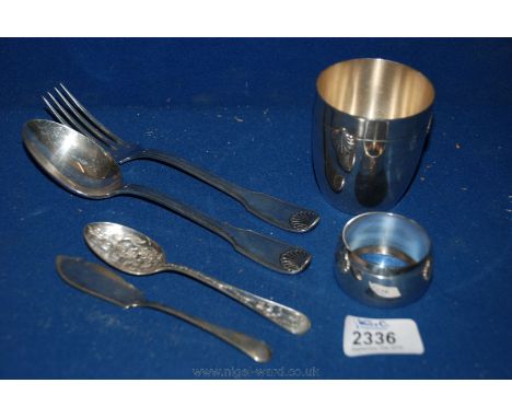 A  'Christofle' spoon and fork, epns beaker and napkin ring, butter knife and child's spoon.