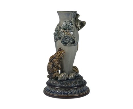 Rare antique stoneware glazed figural candle holder in blue and brown tones. Depicts a hand sculpted scene of a mother rabbit