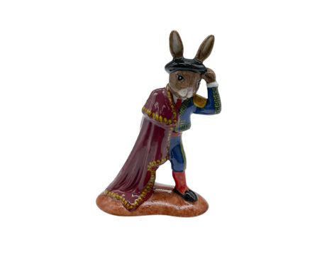 Rare hand decorated prototype porcelain bunny figure dressed as torero. Shown in a blue traditional bullfighter attire with a