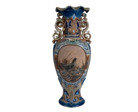 Rare, English pottery vase. Hand modeled and hand decorated with Art Nouveau style floral reliefs and acanthus handles. Featu