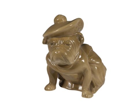 An olive colored bulldog sits on its hind legs, sporting a hat, a kilt, and a satchel. Royal Doulton backstamp. Artist: tbdDi