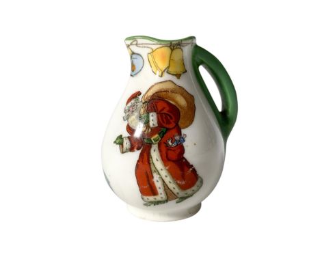 A white pitcher adorned with green accents features a cheerful Santa Claus and a charming Christmas saying. Royal Doulton bac