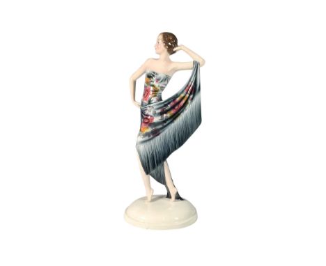 A stunning glossy figure of a woman draped in a shawl that wraps around her arm. Artist signature impressed on base. 6111 7 1