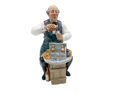 Rare hand modeled and hand decorated porcelain figure of a butler sneaking a glass of whisky from his master's tantalus. The 