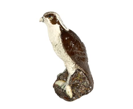 A sculpture of an Osprey made for Whyte &amp; Mackay Scotch Whisky Glasgow, Scotland. Marked to base with Royal Doulton and W