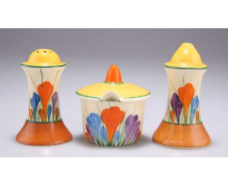 A CLARICE CLIFF BIZARRE CROCUS PATTERN THREE-PIECE CONDIMENT SET Newport pottery backstamps. (3) 8.5cm high and smallerAll wi