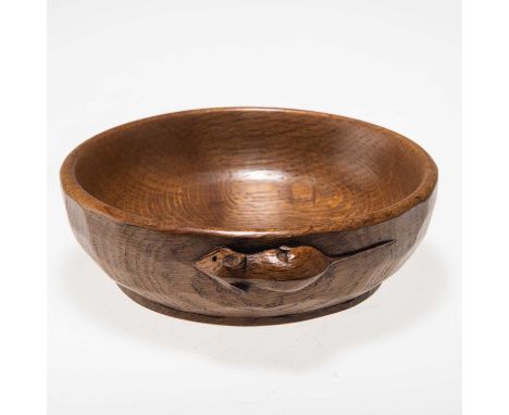 ROBERT THOMPSON OF KILBURN, A MOUSEMAN OAK NUT BOWL circular, adzed exterior, with carved mouse signature. 16.5cm diameterLov