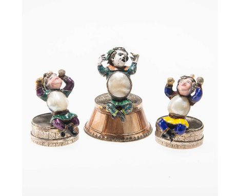 THREE AUSTRIAN SILVER, ENAMEL AND PEARL FIGURES Vienna, 19th Century, the first by Hermann Boehm, the smaller pair by Ludwig 