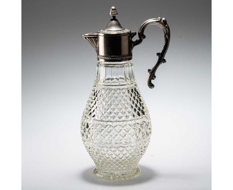 A SILVER-PLATE MOUNTED CLARET JUG of baluster form with scroll handle. 30cm high