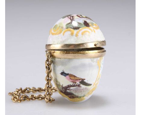 A BILSTON ENAMEL 'EGG' CHÂTELAINE BONBONNIÈRE c.1780, decorated with a bird and landscape vignette, with suspension chain. 4.