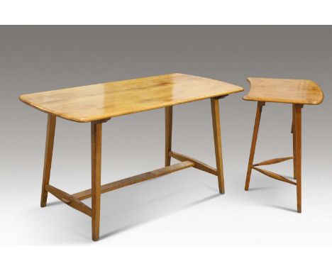 A 1950S ERCOL DINING TABLE AND EXTENDER with plank top, labelled. (2) 73.5cm high, 136.5cm long (plus extender 45.5cm), 68cm 