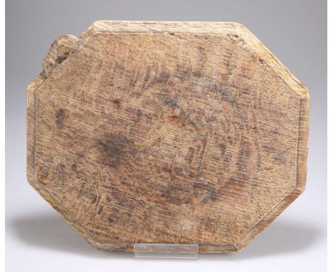 ROBERT THOMPSON OF KILBURN, A MOUSEMAN OAK BREADBOARD of typical rectangular form with canted corners, with carved mouse sign