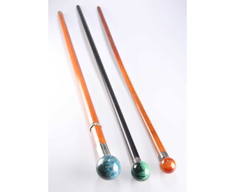 A SWORDSTICK late 19th/early 20th Century, with a spherical hardstone handle and unmarked collar, 68.5cm blade; together with