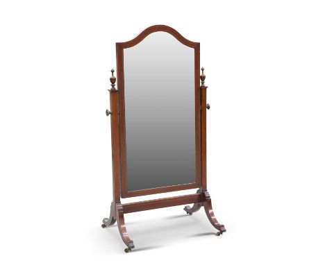 AN EDWARDIAN STRING-INLAID MAHOGANY CHEVAL MIRROR the bevelled mirror plate with arch top, within a conforming frame, swivell