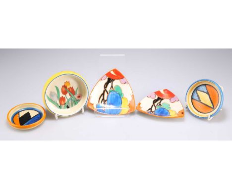 FIVE CLARICE CLIFF PIN TRAYS comprising TWO ORIGINAL BIZARRE PATTERN CIRCULAR PIN TRAYS, 7.5cm diameter; TWO BLUE AUTUMN TRIA