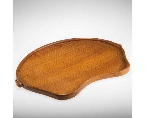 ROBERT THOMPSON OF KILBURN, A MOUSEMAN OAK TRAY kidney-shaped, with twin mouse handles, adzed, with small patch repair. Appro