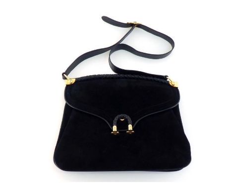 A Gucci vintage suede handbag with braided leather detailing and goldtone hardwear. Leather lined with 4 interior pockets, st