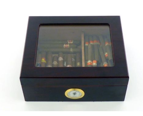 A cigar humidor with view panel and hygrometer containing  about 45 small Willem cigars and 13  various larger ones, all appa