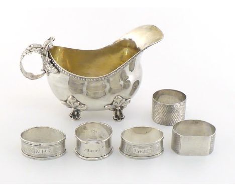 A Continental silver sauceboat stamped "830", probably Scandinavian, late 19th/early 20th century, with bead rim, four leaf f