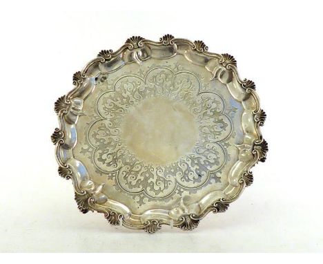 A good Victorian silver salver by Daniel &amp; Charles Houle, London, 1860, with shell and scroll borders on three conforming