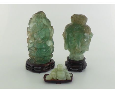 Two Chinese carved green fluorite objects, one carved as Buddha, the other one carved as the head of Budda; together with a n