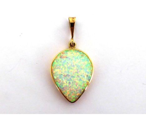 A synthetic opal pendant, 2.5cm long, mounted in 9 carat gold, 3.7gms CONDITION: good 