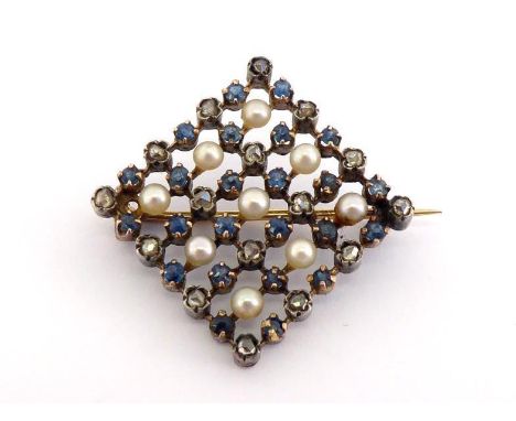 An early 20th century French 18 carat gold, sapphire, diamond and seed pearl brooch, composed of a grid of alternate round cu