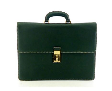 A Gianfranco Ferre gentleman's briefcase in green leather with goldtone hardware. Combination lock to the front and four sect
