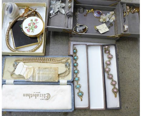 A jewellery box with costume jewellery, a cigarette case and a Stratton compact