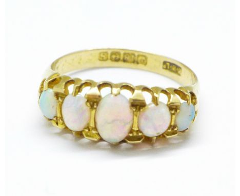 An 18ct gold and opal ring, 3.1g, R