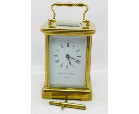 A Matthew Norman carriage clock, two glass panels a/f