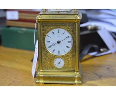 A good mid-19th century French gilt-brass repeating carriage clock, the white enamel dial and subsidiary dials with Roman and