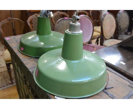 A pair of mid-century vintage green enamel pendant lamps. 40cm