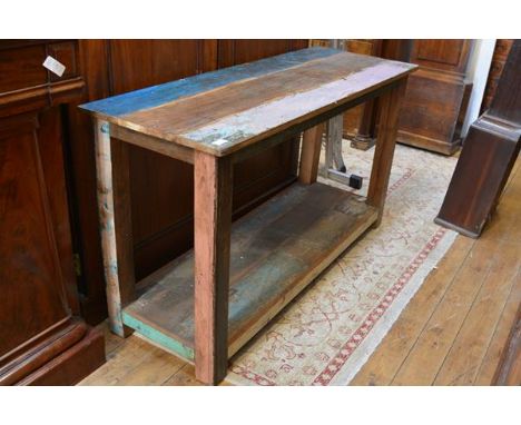 A contemporary distressed painted hardwood side table, the triple plank rectangular top raised on legs joined by a shelf stre