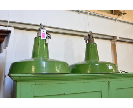 A pair of mid-century vintage green enamel pendant lamps. 40cm
