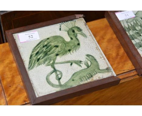 A William de Morgan pottery tile, c. 1900, Peacock and Lizard, decorated in green, Sands End Pottery mark, (heavily crazed, l