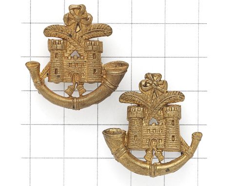 Duke of Cornwall’s Light Infantry collar badges circa 1882. Two die-stamped facing examples of the short-lived brass turreted