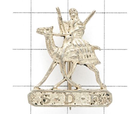 Africa. Sudan Defence Force Officer’s small head-dress badge. A good cast native silver example. Armed Arab on camel resting 