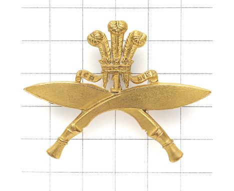 Indian Army. 1st Gurkha Rifles head-dress badge circa 1911-38. A fine die-stamped gilt brass example. Crossed kukris surmount