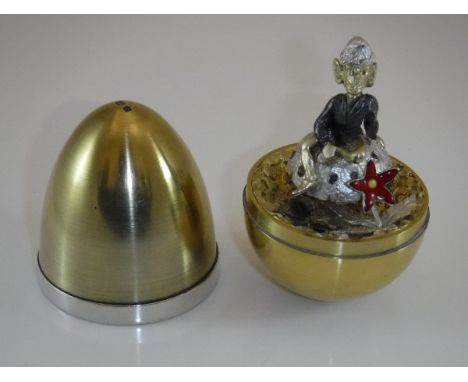 A late 20th Century silver gilt Stewart Devlin egg, the egg opening to reveal a pixie on toadstool with enamelled flower at h