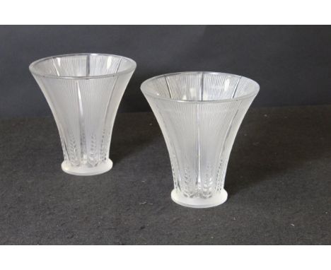 A pair of Lalique glass wild oat or barley decorated trumpet shaped vases raised on a circular foot, inscribed to base "Laliq