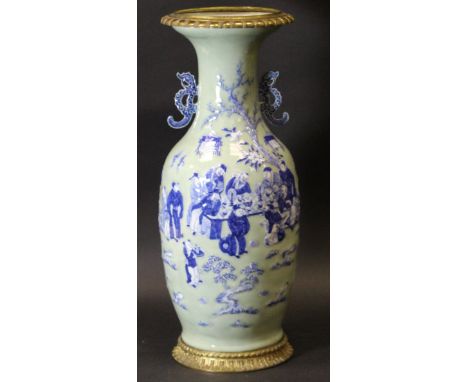 A 19th Century Chinese celadon glazed and blue and white decorated baluster shaped vase, the main field depicting figures aro