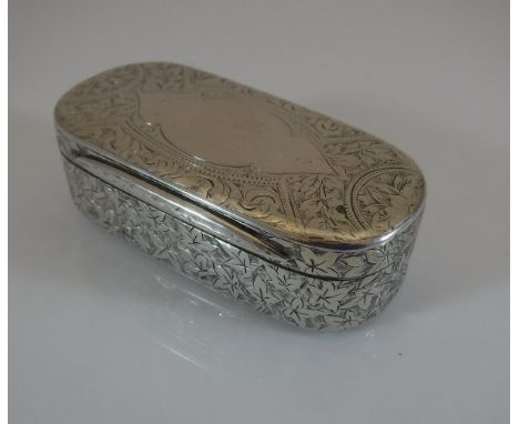 A Victorian silver snuff box with all over foliate engraved decoration opening to reveal a gilt washed interior (by Hilliard 