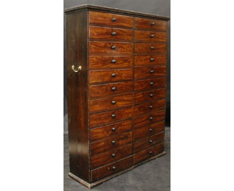 A Victorian painted/stained pine mahogany effect bank of 24 drawers with turned wooden handles, each inscribed with letters o