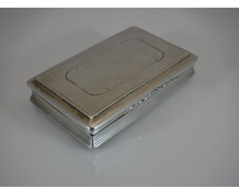 A Victorian silver snuff box of waisted rectangular form, the lid and base with engine turned decoration, the sides reeded, o