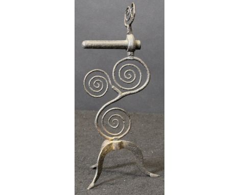 An 18th Century wrought iron goffering iron stand with triple scrollwork decoration, raised on a cabriole tripod base, 27 cm 