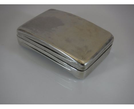 A late George III silver snuff box of plain curved rectangular form opening to reveal a gilt washed interior (by Samuel Pembe