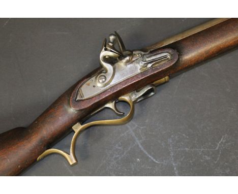 A Baker style rifle inscirbed "Brander", the plain barrel with various proof marks and flintlock action, the stock with brass